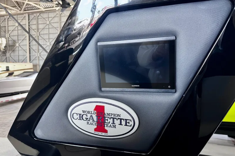  Yacht Photos Pics Cigarette 42' Auroris 2025 with Garmin display and racing team logo.