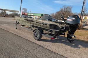 2026 Tracker Grizzly 1650 T Prairie Wings Edition boat with Mercury engine on trailer.