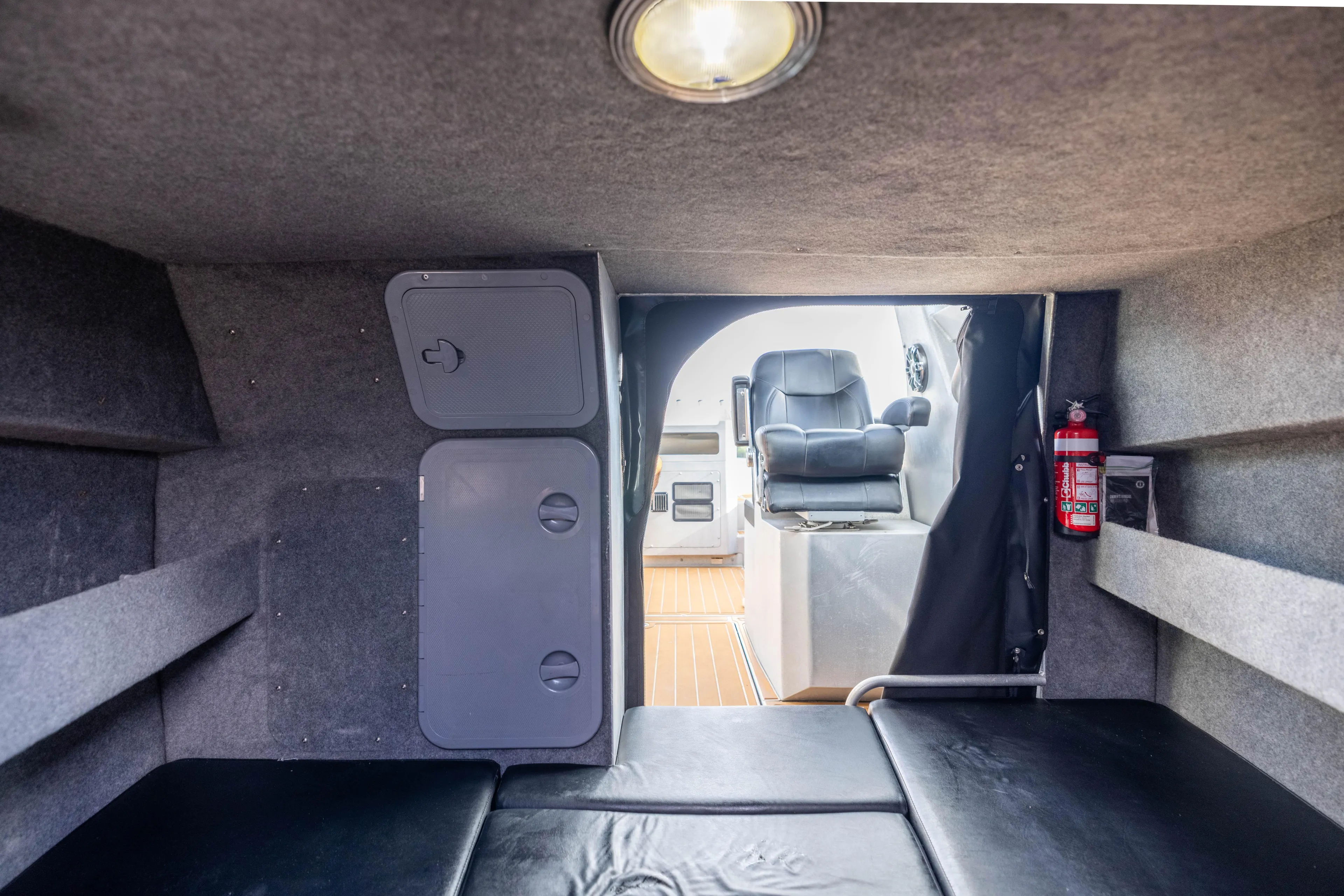 Latitude Yacht Photos Pics Interior of 2022 Sealegs 8.5M boat, featuring seating and storage compartments.