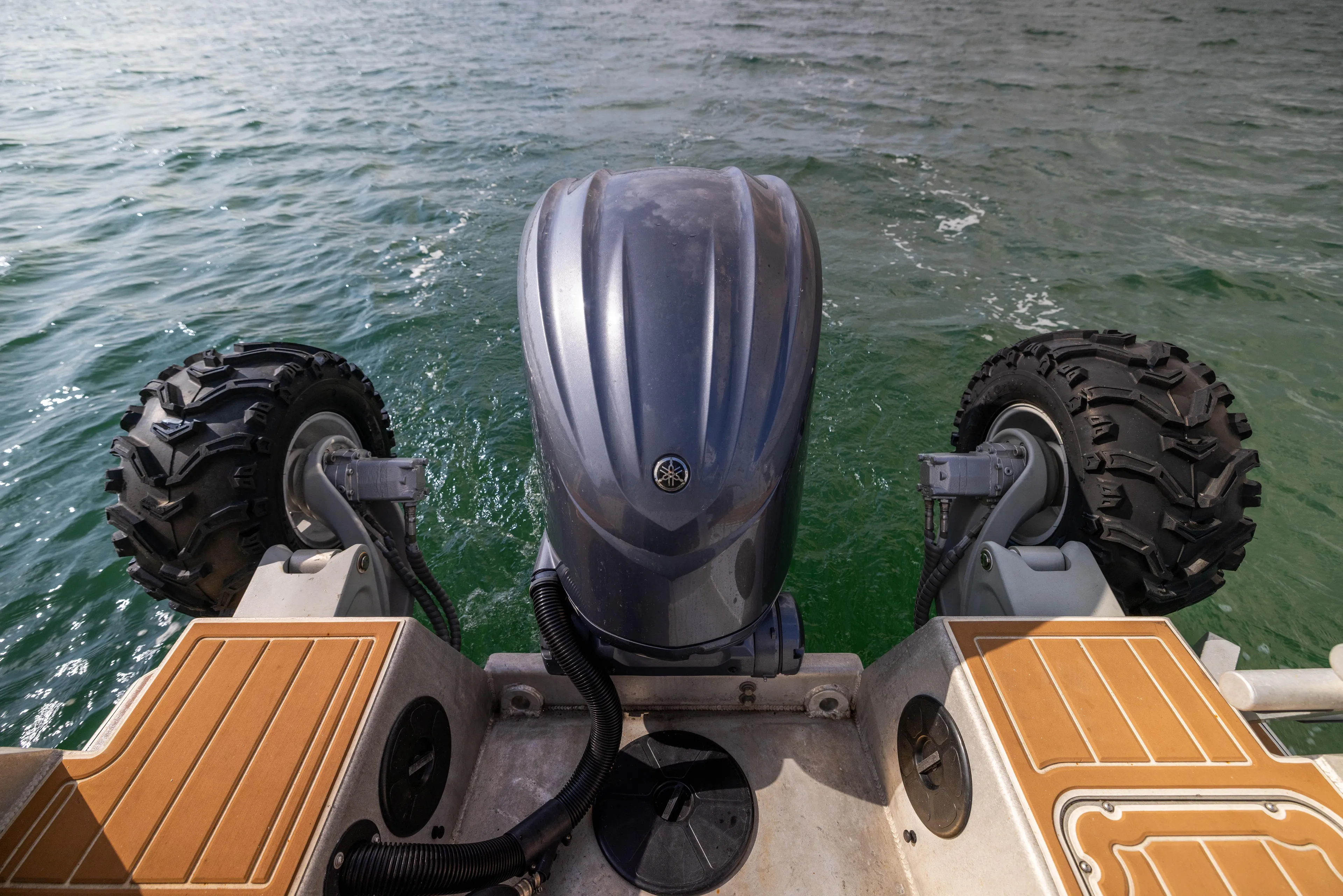 Latitude Yacht Photos Pics Sealegs 8.5M 2022 amphibious boat with wheels and motor in water.