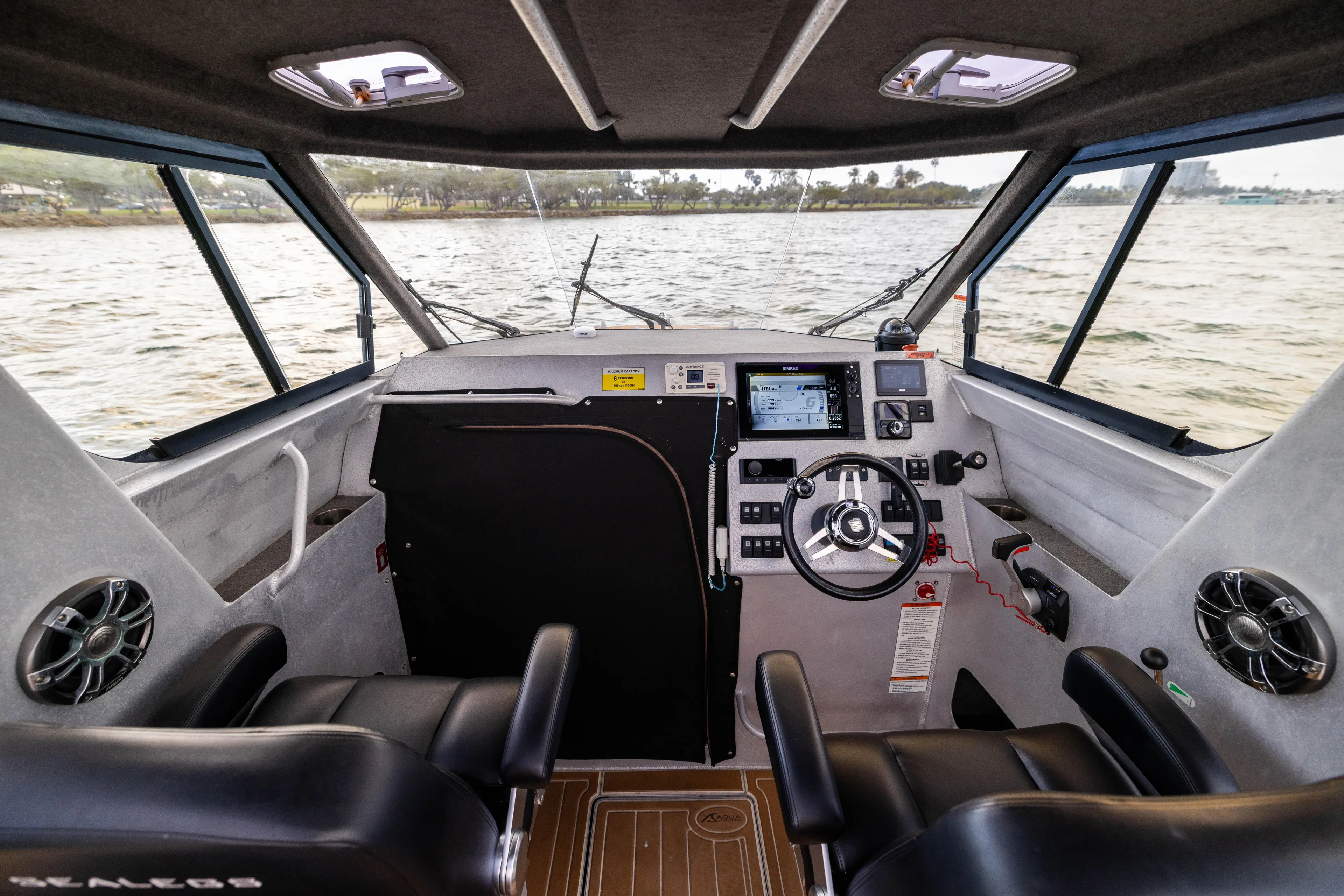 Latitude Yacht Photos Pics Interior of 2022 Sealegs 8.5M boat with modern dashboard and steering wheel.
