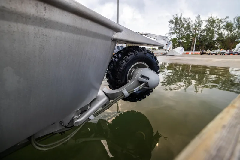 Latitude Yacht Photos Pics Sealegs 8.5M 2022 amphibious boat with retractable wheels in shallow water.