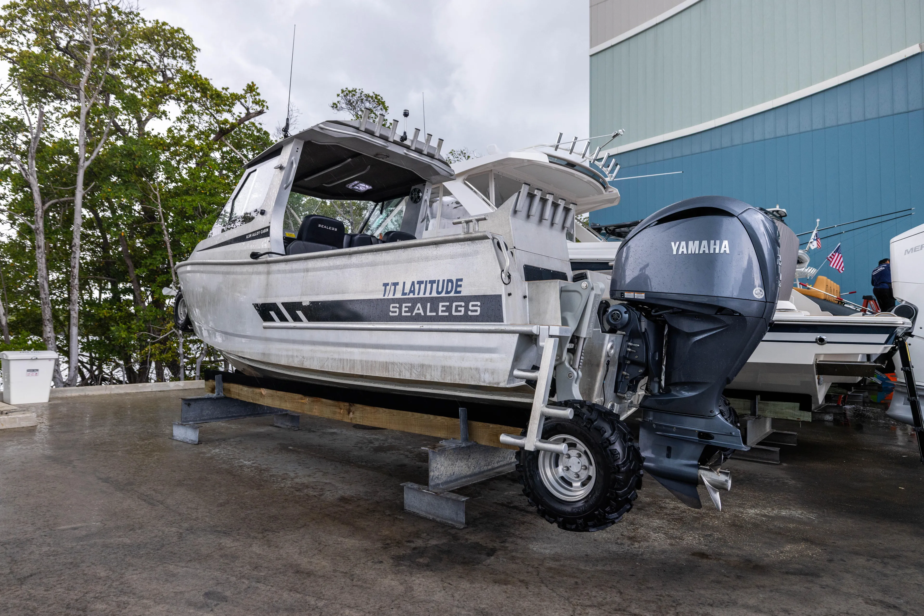 Latitude Yacht Photos Pics 2022 Sealegs 8.5M boat with Yamaha engine on display in a marina setting.