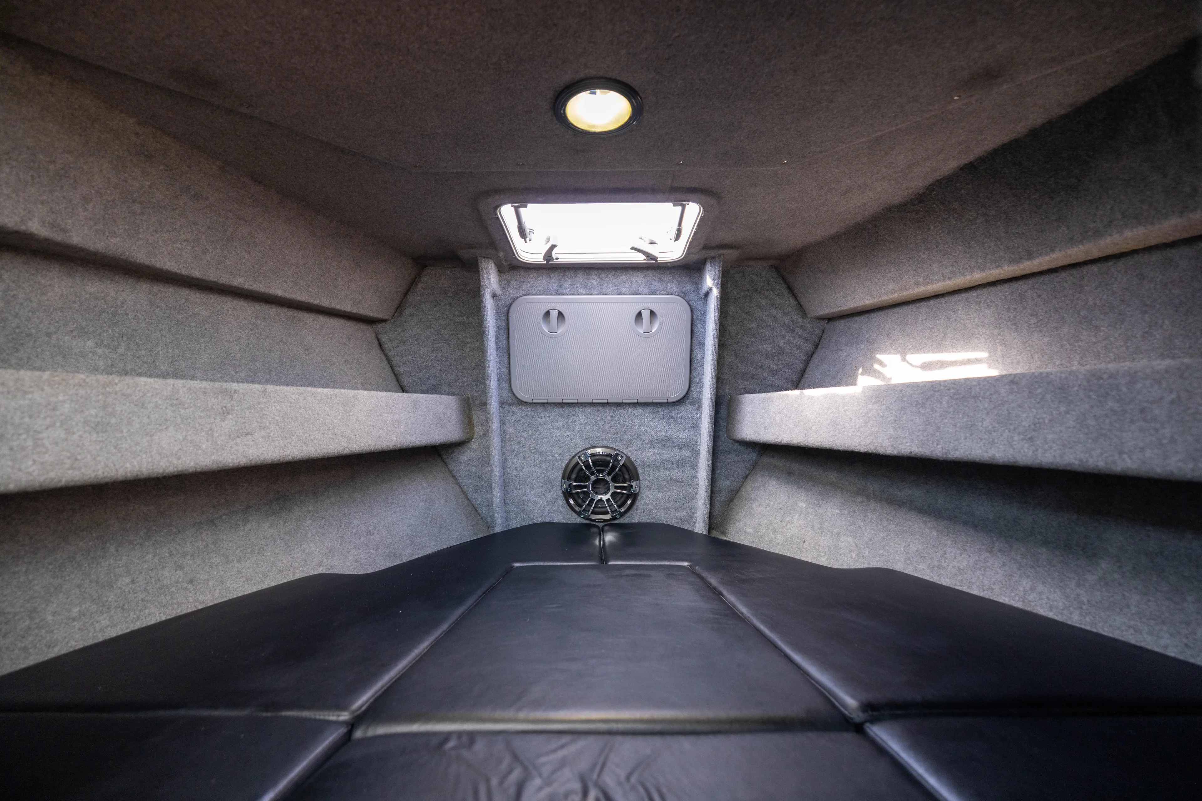 Latitude Yacht Photos Pics Interior cabin of 2022 Sealegs 8.5M boat with cushioned seating and overhead lighting.