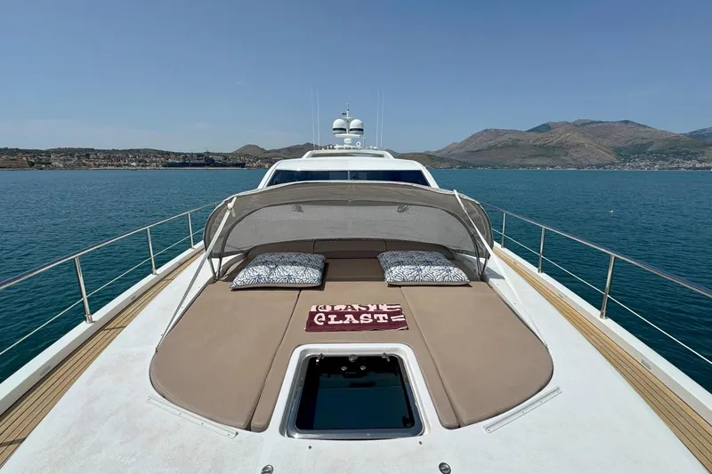 @last Yacht Photos Pics Luxury Leopard 24 yacht deck with sunbathing area, 2003 model, scenic ocean view.