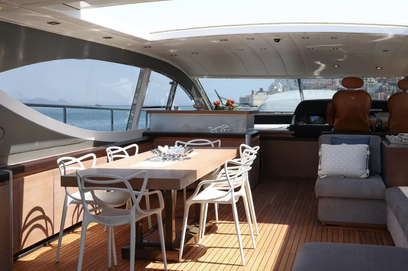 @last Yacht Photos Pics Luxurious 2003 Leopard 24 yacht interior with dining area and ocean view.