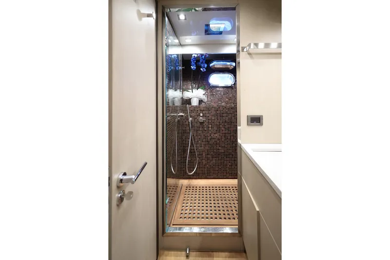@last Yacht Photos Pics Luxurious bathroom in 2003 Leopard 24 yacht with modern shower and elegant design.