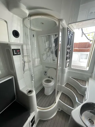  Yacht Photos Pics 2008 Yellowfin 42 boat bathroom with shower, toilet, and modern fixtures.
