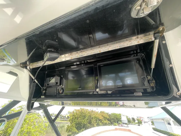  Yacht Photos Pics 2008 Yellowfin 42 boat dashboard with electronic navigation and communication equipment.