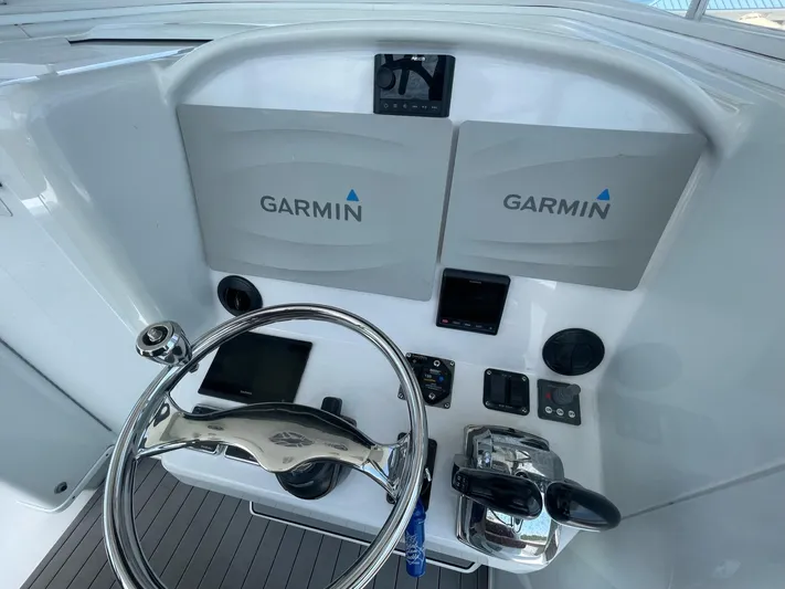  Yacht Photos Pics Control panel of a 2008 Yellowfin 42 boat with Garmin navigation systems.