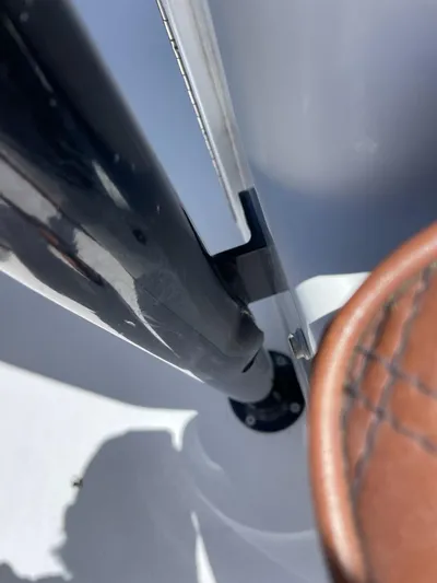  Yacht Photos Pics Close-up of a 2008 Yellowfin 42 boat detail, featuring a polished metal and leather component.