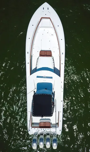  Yacht Photos Pics Aerial view of a 2008 Yellowfin 42 boat on green water.