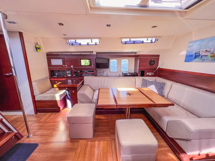  Yacht Photos Pics Luxurious interior of 2010 Hanse 545 yacht with elegant seating and modern amenities.