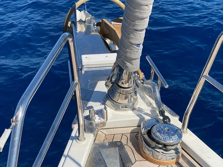  Yacht Photos Pics Bow of 2010 Hanse 545 yacht with winch and blue ocean background.