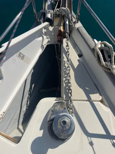  Yacht Photos Pics Bow of 2006 Beneteau Oceanis Clipper 523 with anchor chain and winch.