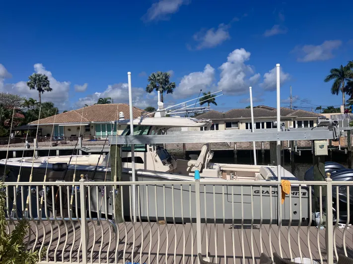  Yacht Photos Pics 2020 Grady-White Canyon 336 boat docked under clear blue sky.