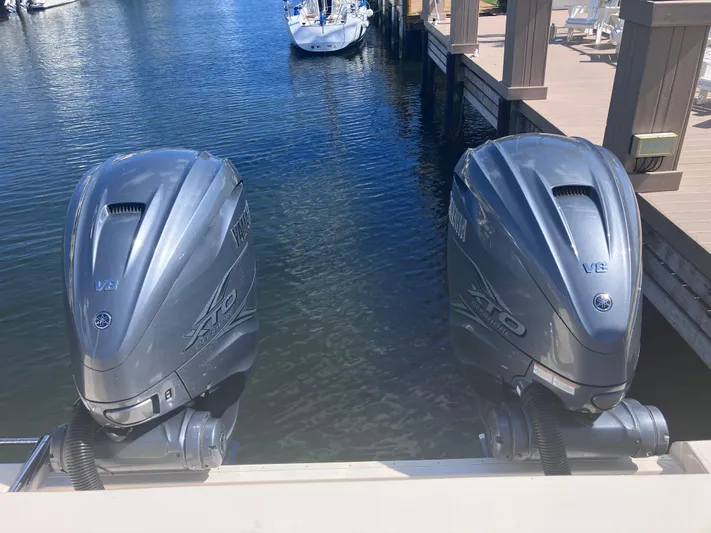  Yacht Photos Pics Twin Yamaha outboard engines on a 2020 Grady-White Canyon 336 boat at a dock.