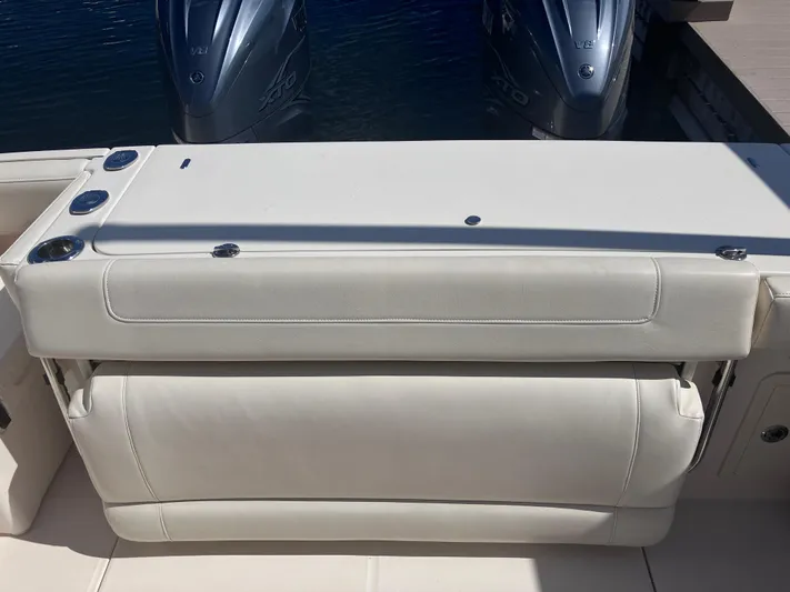  Yacht Photos Pics 2020 Grady-White Canyon 336 boat with dual outboard engines and cushioned seating.