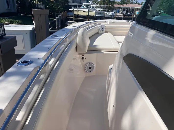  Yacht Photos Pics 2020 Grady-White Canyon 336 boat interior with seating and speaker.