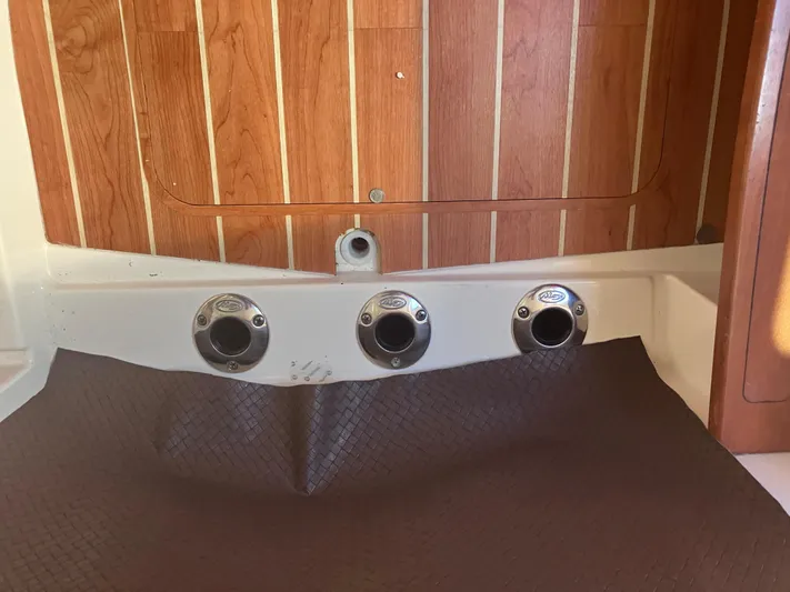  Yacht Photos Pics Interior view of 2020 Grady-White Canyon 336 boat with wood paneling and fixtures.