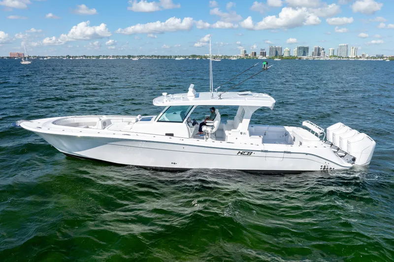  Yacht Photos Pics 2026 HCB 48 Campeon boat cruising on open water under a clear sky.