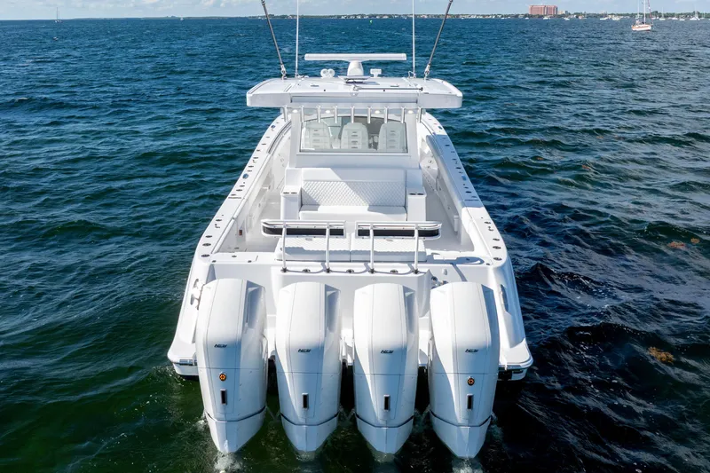  Yacht Photos Pics 2026 HCB 48 Campeon boat with four engines on open water.