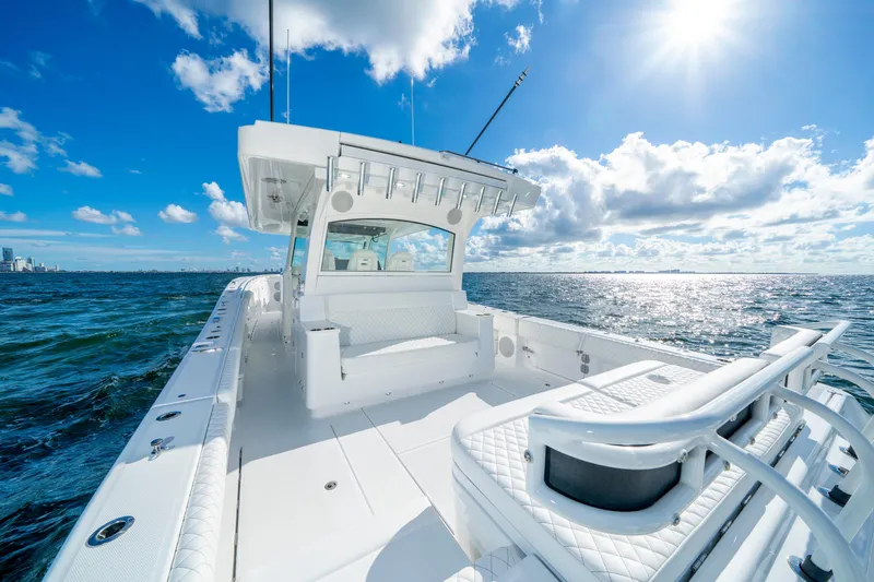  Yacht Photos Pics 2026 HCB 48 Campeon boat on open water under sunny sky.