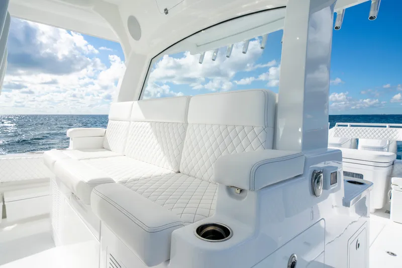  Yacht Photos Pics Luxurious seating on 2026 HCB 48 Campeon yacht with ocean view.