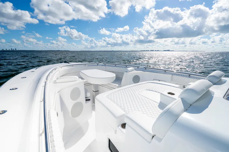  Yacht Photos Pics Luxurious 2026 HCB 48 Campeon boat interior with ocean view and clear skies.