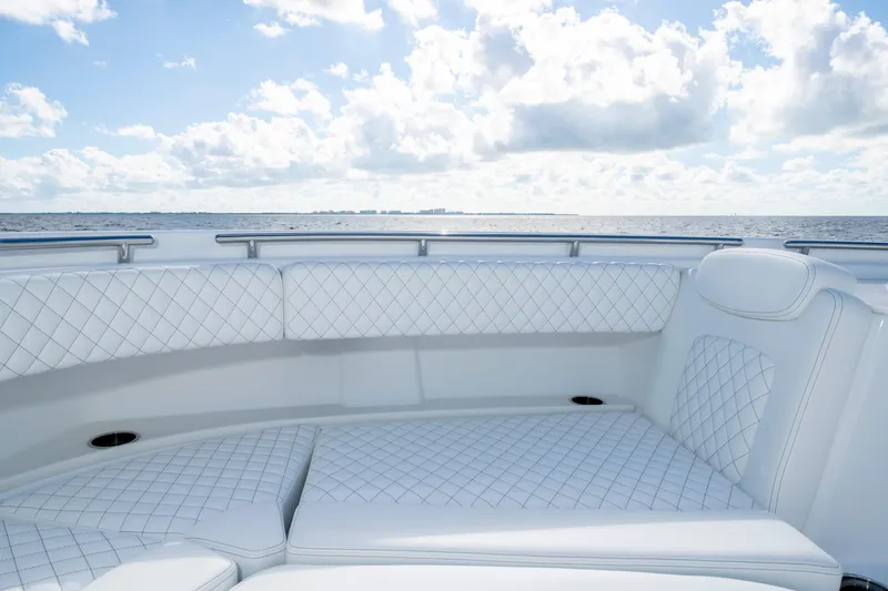  Yacht Photos Pics Luxurious seating on 2026 HCB 48 Campeon boat with ocean view.