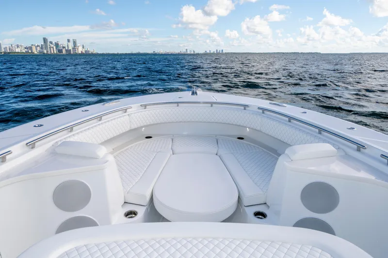  Yacht Photos Pics Luxurious 2026 HCB 48 Campeon boat interior with ocean and city skyline view.