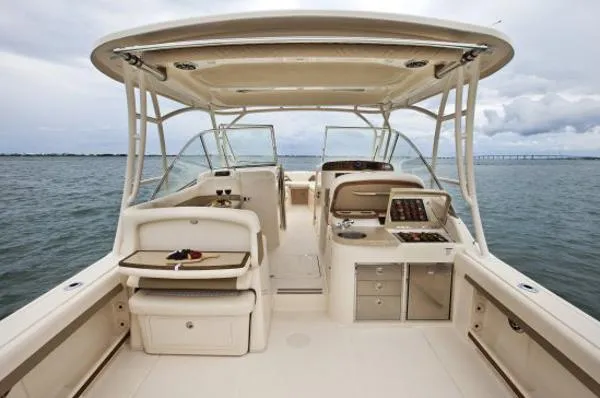 No Name Yacht Photos Pics 2013 Grady-White Freedom 335 boat interior with helm, seating, and ocean view.