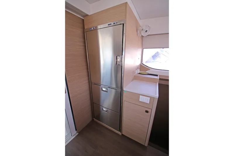  Yacht Photos Pics Modern kitchen area in 2025 Lagoon 43 yacht with stainless steel appliances.