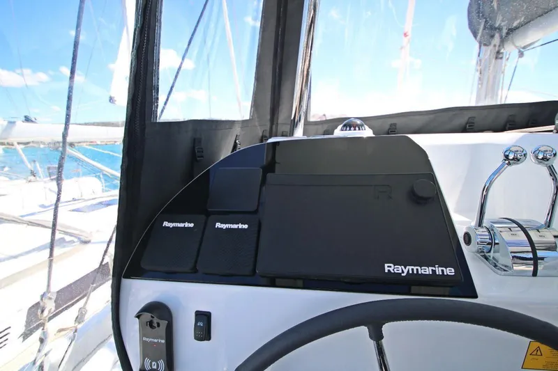  Yacht Photos Pics Cockpit of 2025 Lagoon 43 yacht with Raymarine navigation equipment.