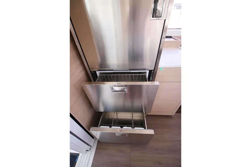  Yacht Photos Pics Stainless steel refrigerator drawers in Lagoon 43, 2025 model yacht interior.