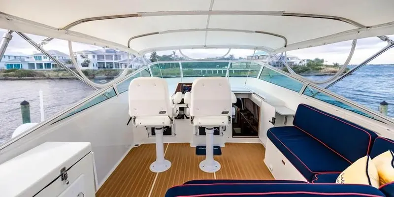  Yacht Photos Pics Interior of 2000 Pacific Mariner 65 Motoryacht with helm and seating area.