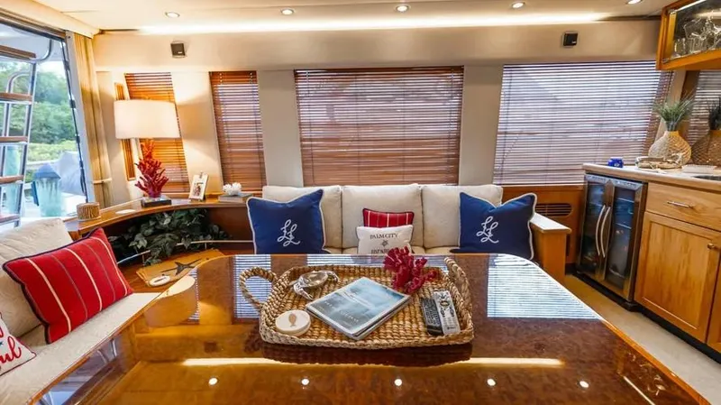  Yacht Photos Pics Luxurious interior of 2000 Pacific Mariner 65 Motoryacht with elegant decor and comfortable seating.