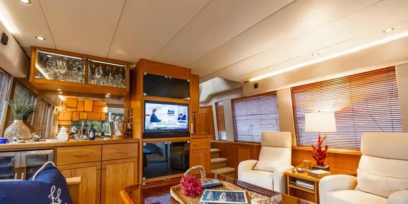  Yacht Photos Pics Luxurious interior of 2000 Pacific Mariner 65 Motoryacht with elegant furnishings and modern amenities.
