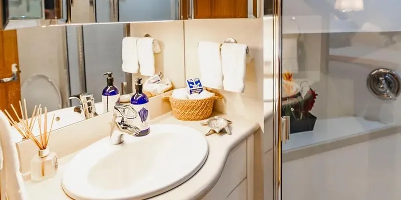  Yacht Photos Pics Luxurious bathroom in 2000 Pacific Mariner 65 Motoryacht with elegant fixtures and amenities.