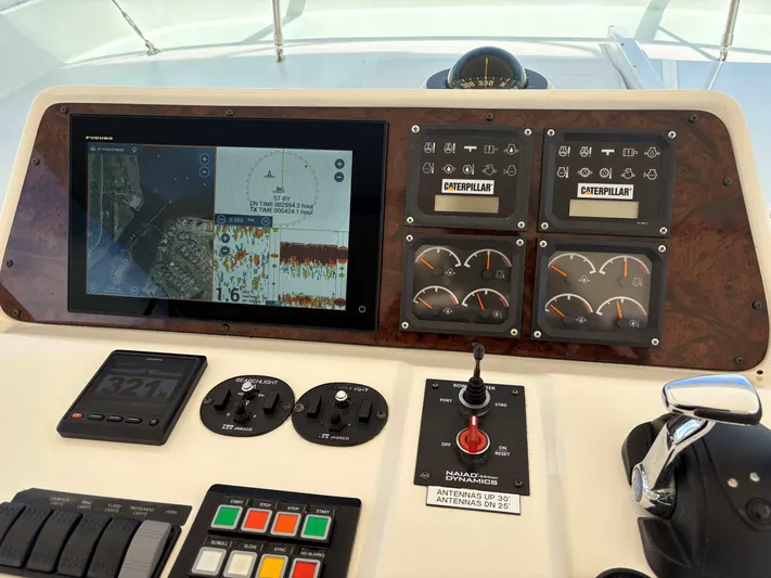  Yacht Photos Pics Control panel of a 2000 Pacific Mariner 65 Motoryacht with navigation and engine gauges.