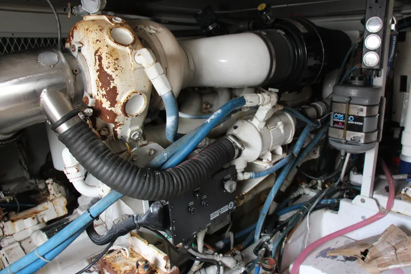Galatea Yacht Photos Pics Engine room of a 2000 Post 50 yacht, featuring complex piping and machinery.