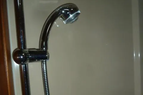 Island Wanderer Yacht Photos Pics Shower head in 2013 Ranger Tugs R-31 boat bathroom.