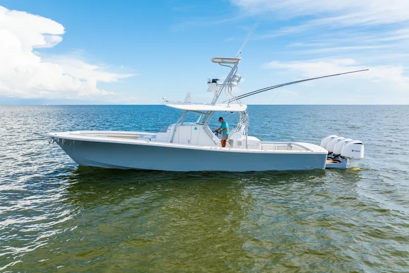  Yacht Photos Pics 2018 Regulator 41 boat on calm ocean with clear blue sky.