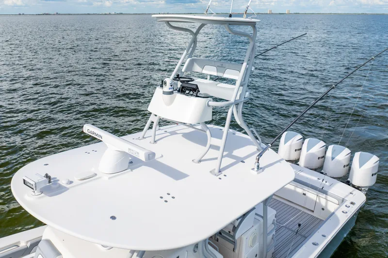  Yacht Photos Pics 2018 Regulator 41 boat with tower and multiple outboard engines on open water.
