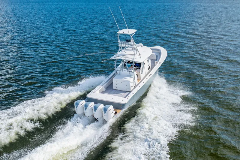  Yacht Photos Pics 2018 Regulator 41 boat cruising on open water, showcasing powerful engines and sleek design.