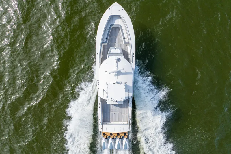  Yacht Photos Pics Aerial view of 2018 Regulator 41 boat cruising on water.