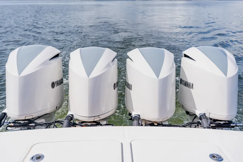  Yacht Photos Pics Four Yamaha outboard engines on a 2018 Regulator 41 boat, cruising on water.