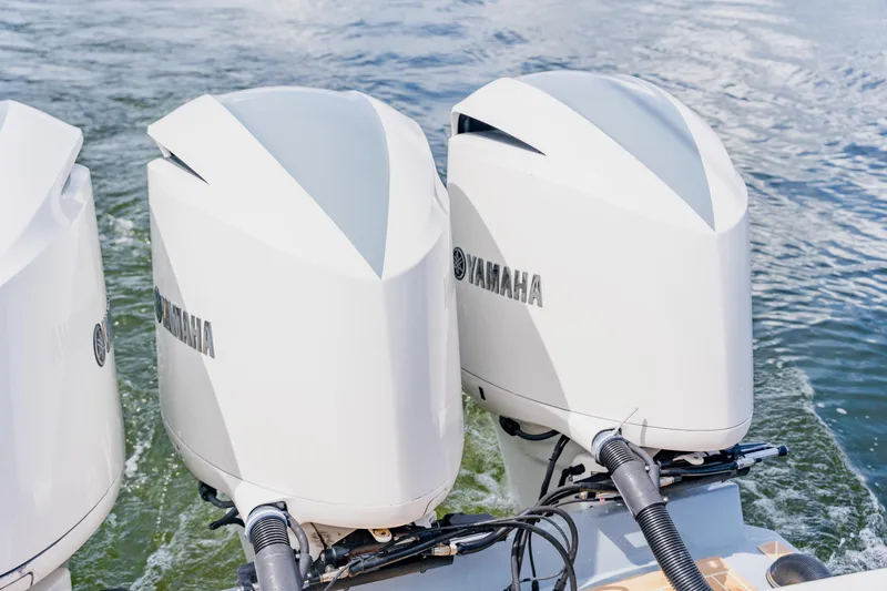  Yacht Photos Pics Twin Yamaha outboard engines on a 2018 Regulator 41 boat, cruising on water.