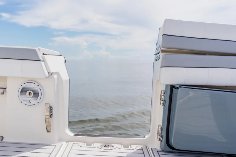  Yacht Photos Pics 2018 Regulator 41 boat deck with ocean view, featuring seating and speaker.