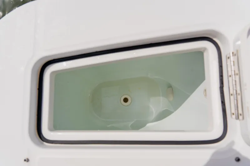  Yacht Photos Pics Livewell compartment on a 2018 Regulator 41 boat, featuring a white interior.